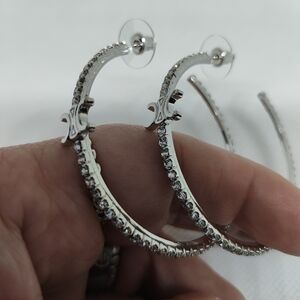 Elegant Silver Hoop Earrings With Stones.